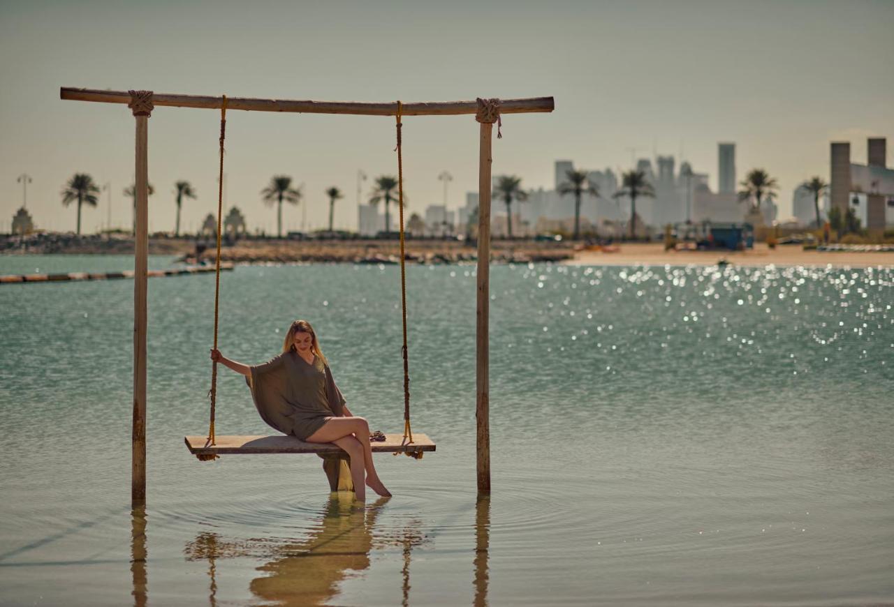 Grand Hyatt Doha Hotel & Villas מראה חיצוני תמונה The Swing